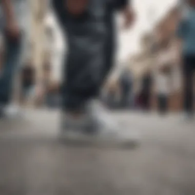 Group of skateboarders showcasing adidas grey suede shoes