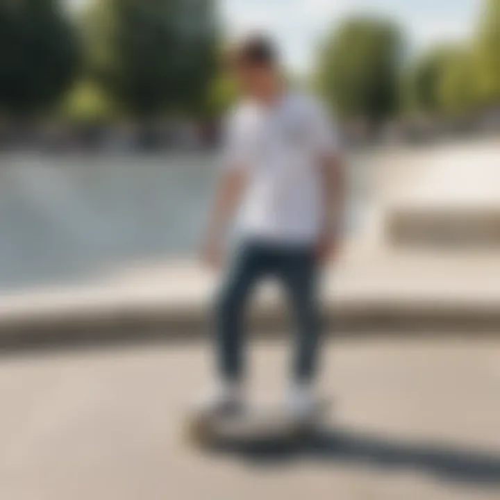 Skateboarder wearing an adidas white tee shirt in an urban skate park setting