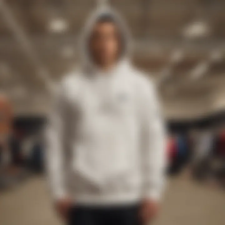 Minimalist styling of the Champion Reverse Weave hoodie displayed on a mannequin, illustrating its versatility in casual fashion.