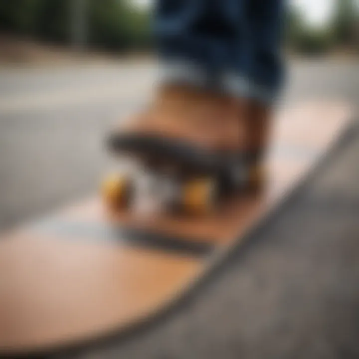 Illustration of a skateboard with the Dakine Spike Stomp Pad applied, demonstrating its position.