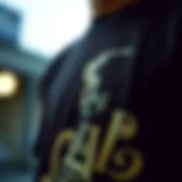 A close-up of a dark brown graphic tee featuring an intricate skateboarding design
