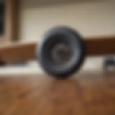 Close-up of skateboard wheels on a wooden surface