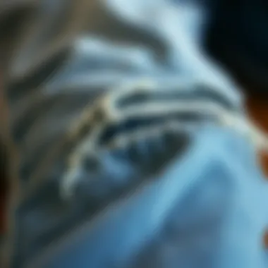 Quality Ripped Denim Detail Close-up of high-quality ripped denim fabric