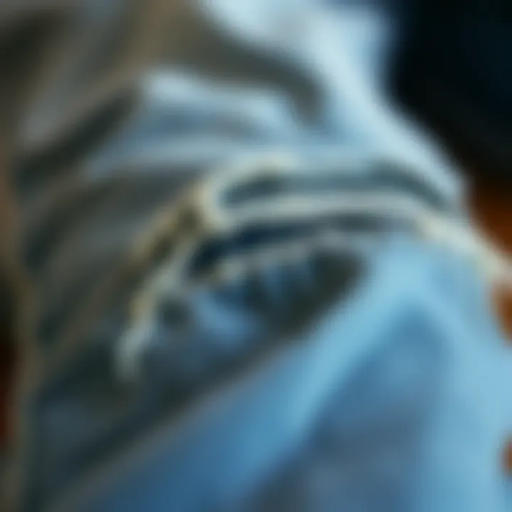 Quality Ripped Denim Detail Close-up of high-quality ripped denim fabric