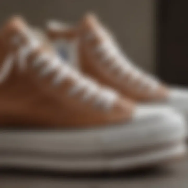 Close-up of the unique design details of brown and white platform Converse