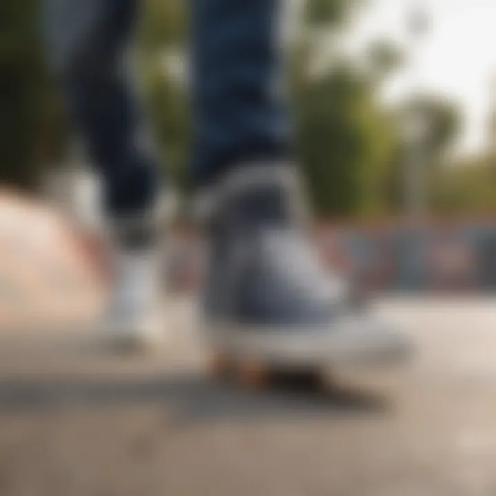 Skateboarder wearing Converse shoes at a skate park