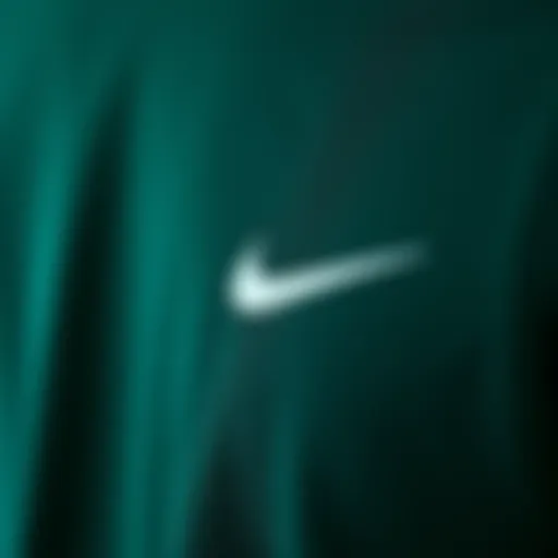 Fabric Texture of Dark Green Nike Shirt Close-up view of the dark green Nike shirt showcasing fabric texture