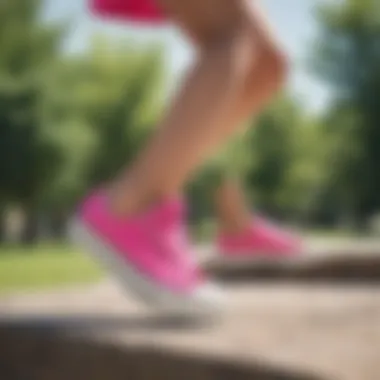 Stylish individual wearing hot pink platform Converse in a park