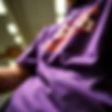 Textural Richness and Craftsmanship Close-up view of fabric and print detail on purple graphic shirt