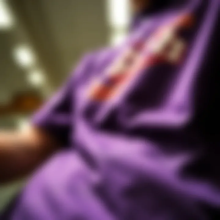 Textural Richness and Craftsmanship Close-up view of fabric and print detail on purple graphic shirt