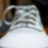 A close-up view of Size 12 White Vans showcasing the unique texture and stitching details.