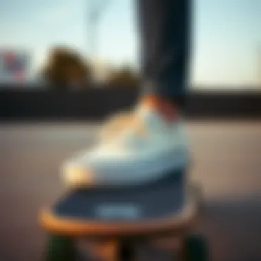 Vans Cream Shoes on a Skateboard Vans cream shoes showcased on a skateboard