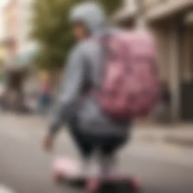 Fashionable individual carrying a grey and pink backpack while skateboarding