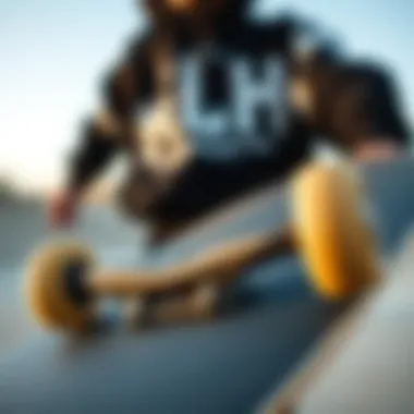 Interconnectedness of Fashion and Skateboarding Close-up of a skateboard deck and black sweatshirt