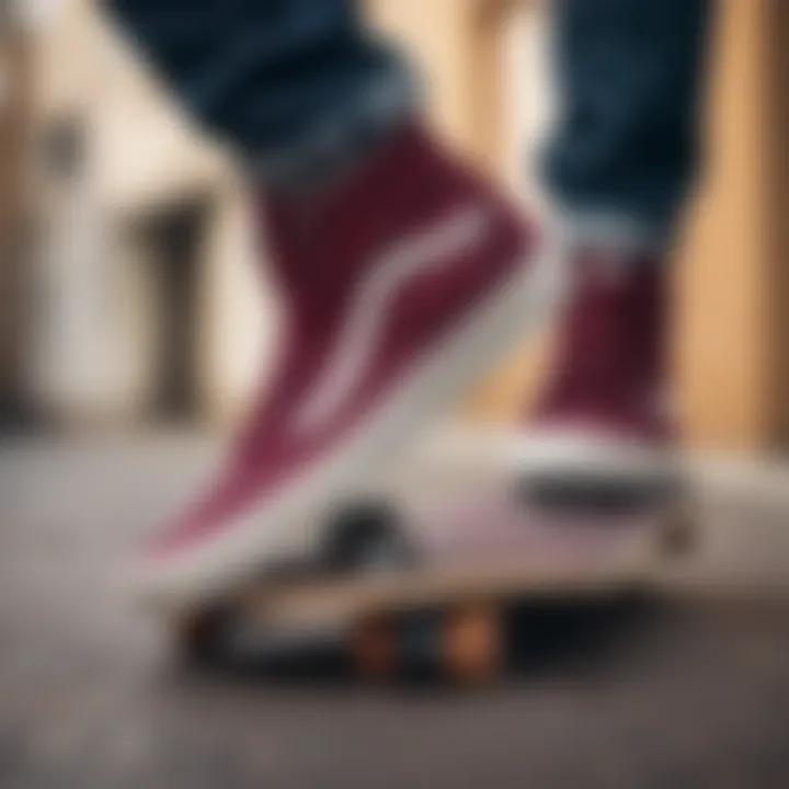 Stylish Burgundy Vans High Top sneakers on a skateboard.