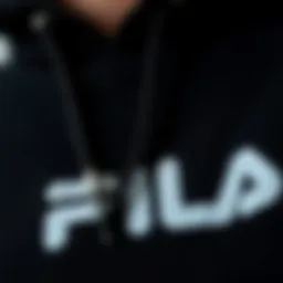 A close-up of the Fila black hoodie showcasing its fabric texture and stitching