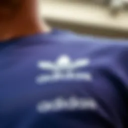 A close-up view of an adidas t-shirt showcasing its fabric texture and branding.