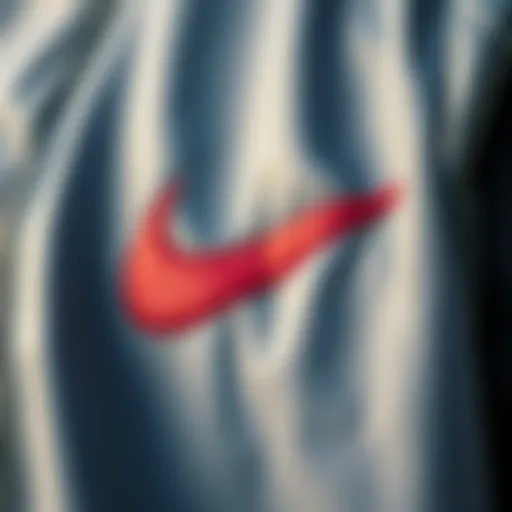 Fabric Quality and Texture Close-up of the fabric texture of the Nike gray jacket