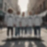 A group of skateboarders showcasing their oversized Adidas shirts in an urban setting.