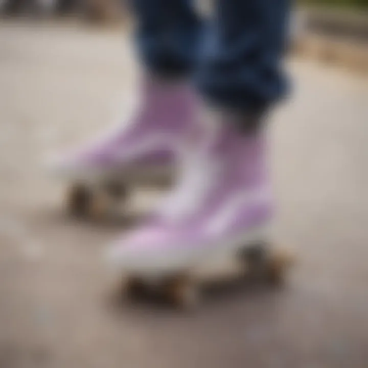 Skateboarder wearing lilac high top Vans at a skate park