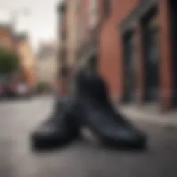 Stylish all black high top Vans against a vibrant urban backdrop