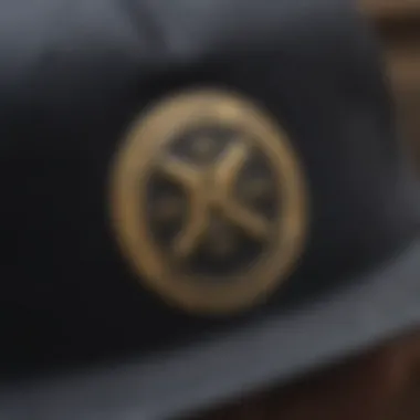 Detail of the Brixton logo on the snapback, highlighting brand identity.