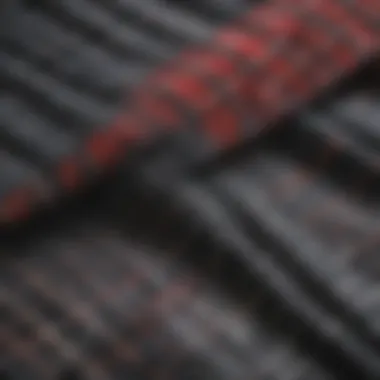 Close-up of Hoonigan flannel fabric with automotive elements